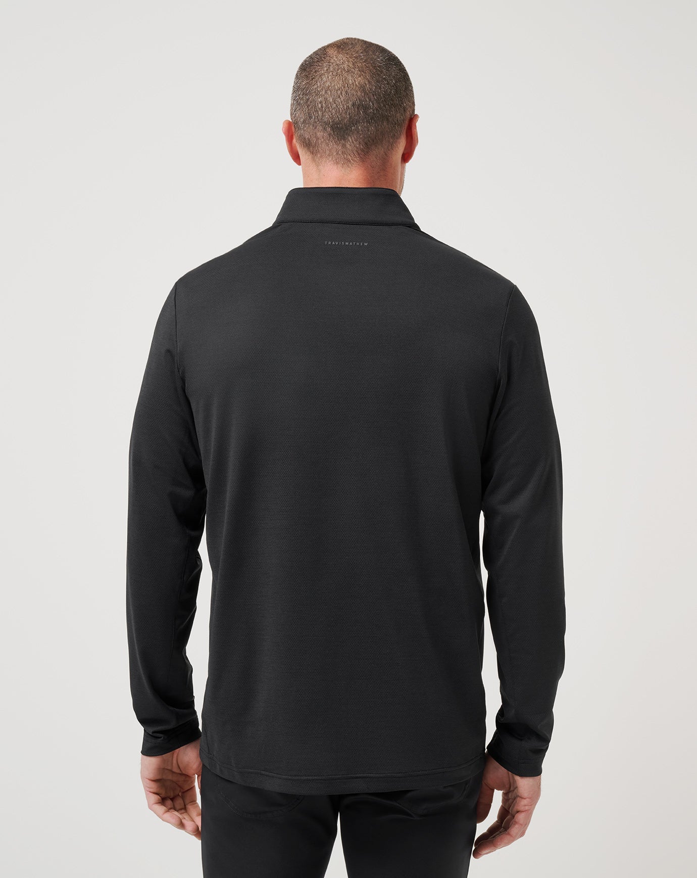 TravisMathew Heater Pro 1/4 Zip in Black