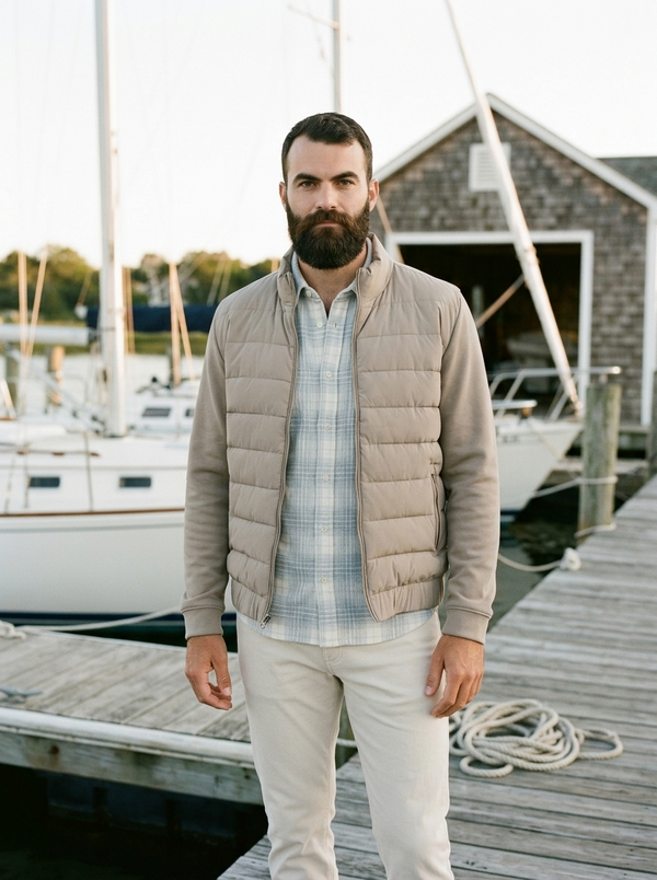 7 Diamonds REV Puffer Full Zip in Clay on a Hamptons yacht dock